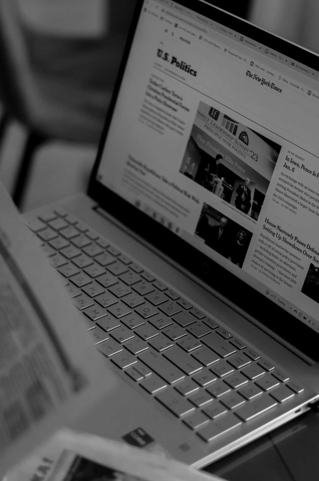 person reading news on laptop