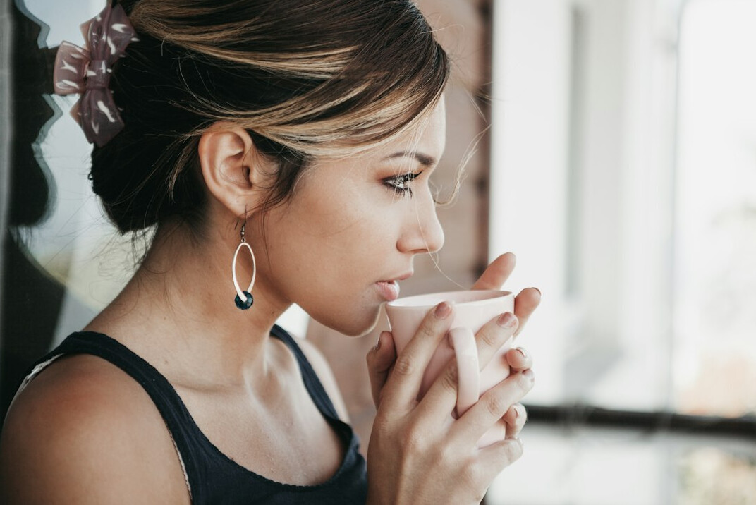 person drinking coffee