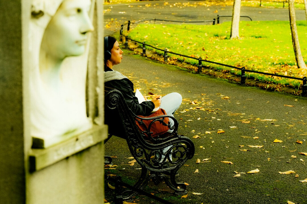 person thinking with book